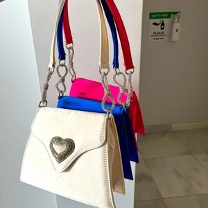 Brand new small romantic heart center shoulder bag .